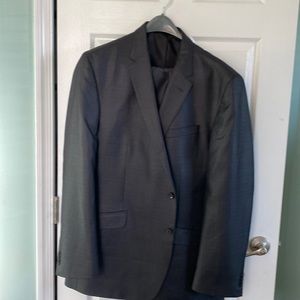 Kenneth Cole Men suit dark gray.